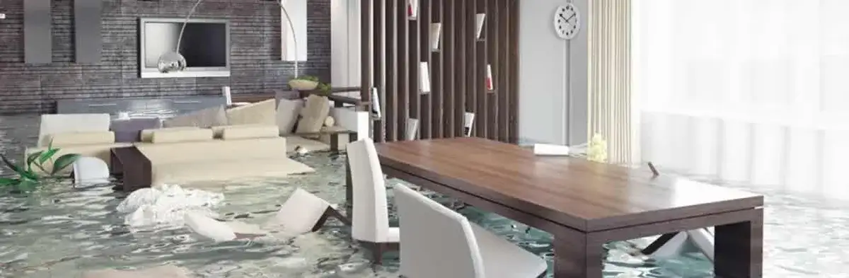 home interior affected by water damage with flooded floors and displaced furniture in Myrtle Beach, SC